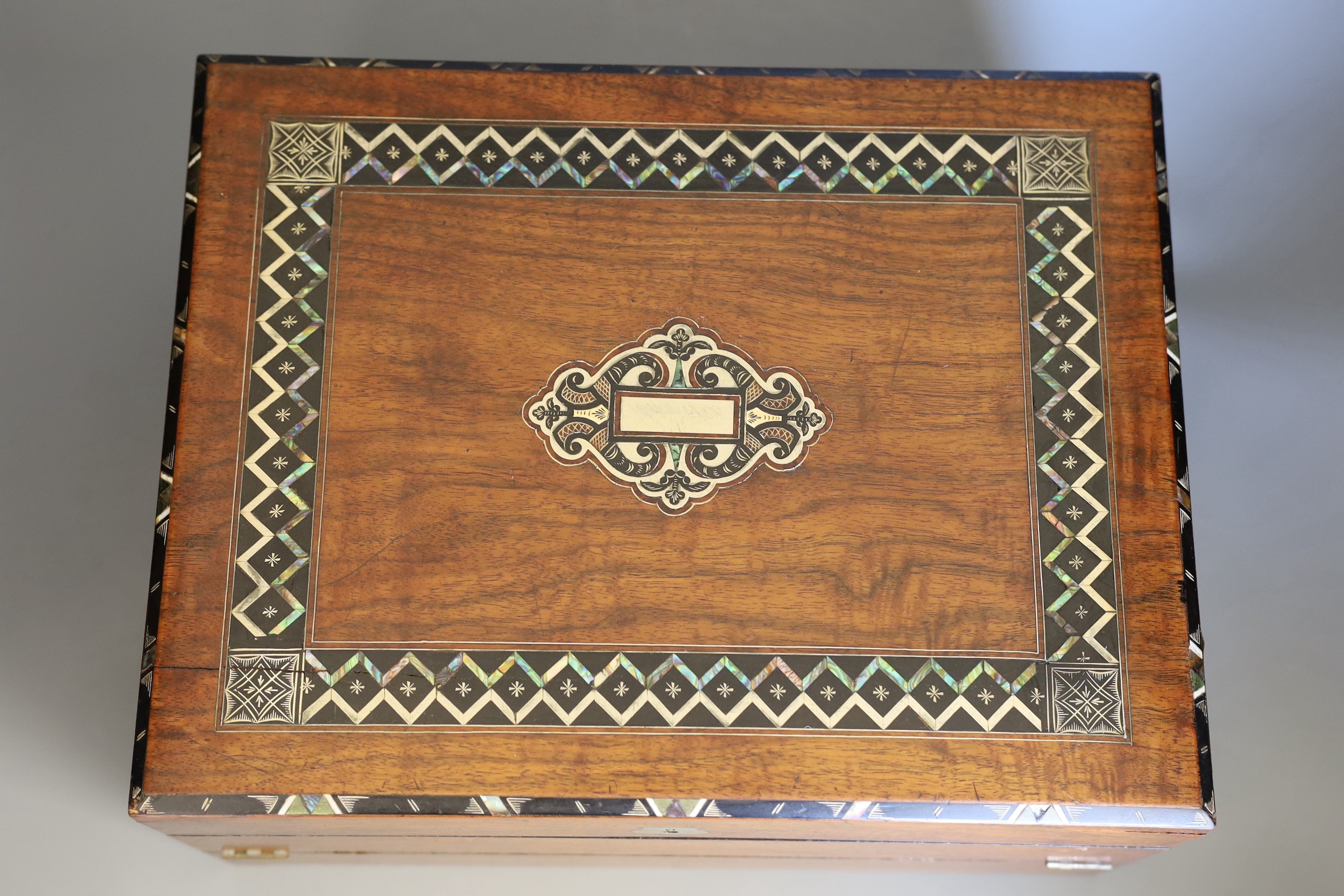 A 19 century mahogany and mother of pearl inlaid writing slope, 36cms wide x 18cms high